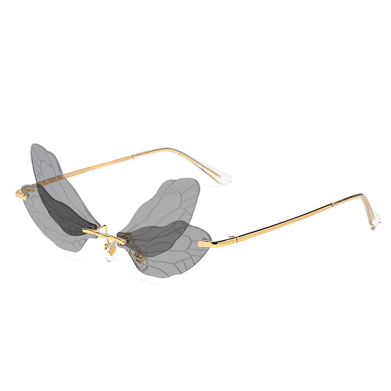 Wholesale Dragonfly Wing Shape Frameless PC Sunglasses